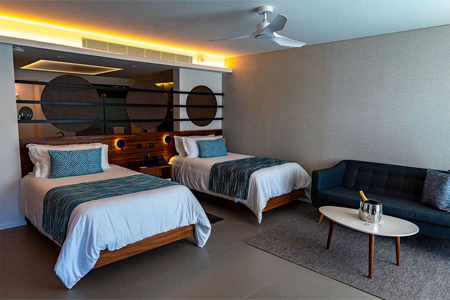 camas twin en dormitorio elegance club junior suite
