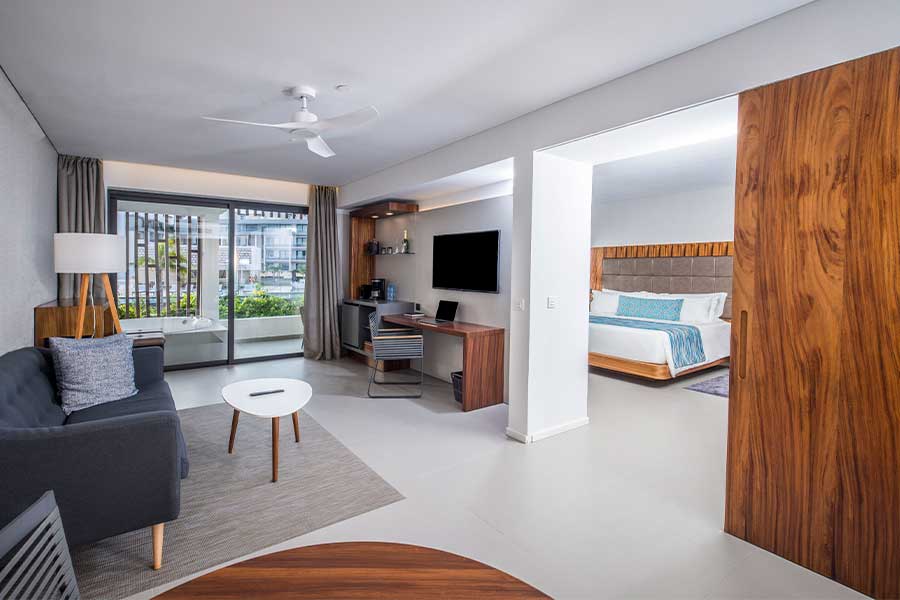 zona de estar y dormitorio elegance club one bedroom suite