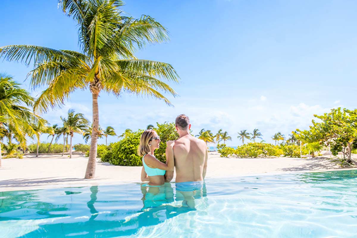 couple pool beach views majestic mirage costa mujeres all suite resort